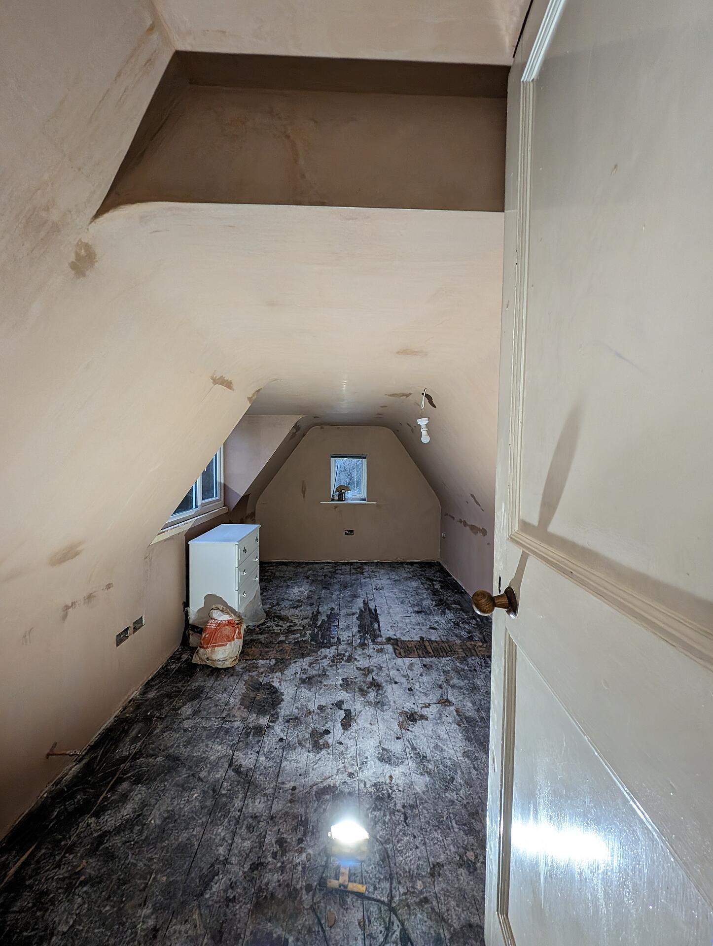 Loft room re-plastered throughout, the finish worked cleanly into the sloping ceilings and dormer